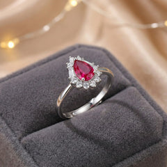 Sterling Silver Ruby and Diamond Ring, Pear-Shaped Red Gemstone, Elegant Wedding Engagement Band with Crystal Accents | BJLR-0011
