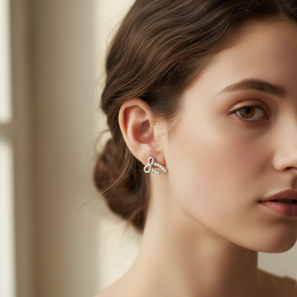 Charming Femininity: 925 Sterling Silver Sparkling Bow Ribbon Stud Earrings| BJER-023